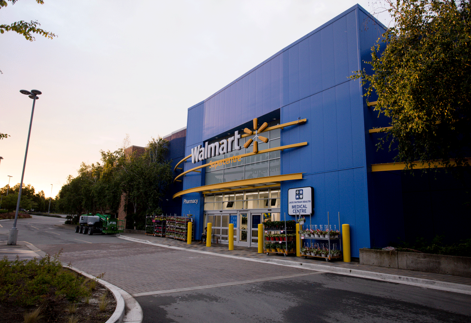 Exterior of a Walmart Supercentre, with Pharmacy and Medical Centre signs